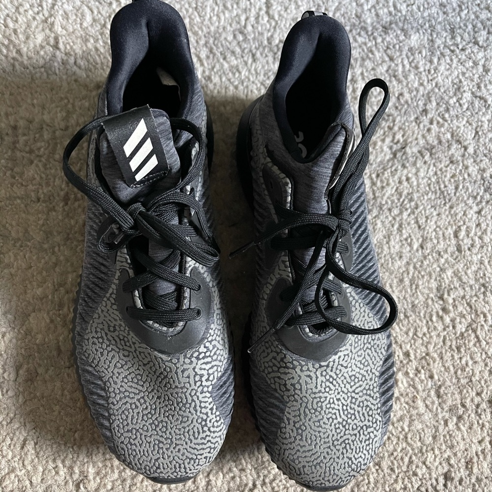 Never worn!  Women’s Adidas Size 8